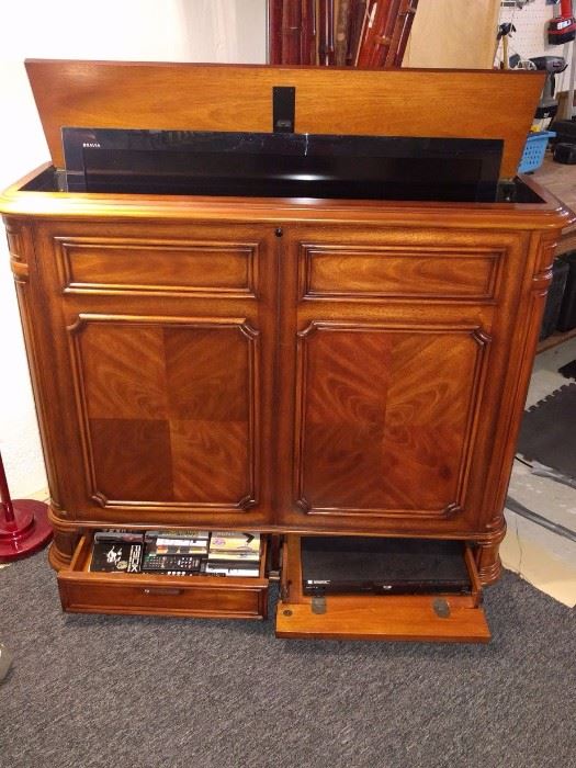 TV Lift Cabinet with two sliding drawers with lay down fronts and infrared sensor for remote control. Holds up to a 40" diagonal TV.