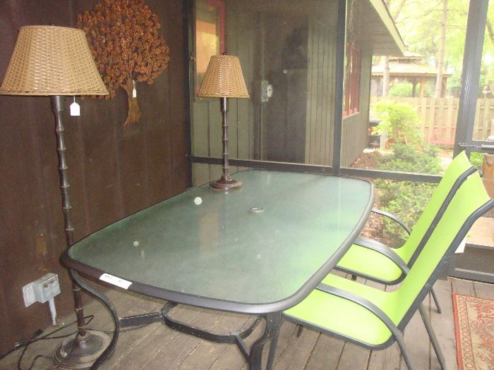Glass patio table. 4 patio chairs, Outdoor lamps, outdoor rugs