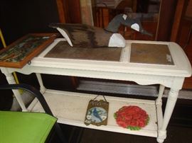 Slate top table, wood carved canadian goose decoy