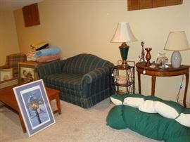 Down comforter. small tables table lamps