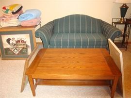 Blankets, loveseat, art