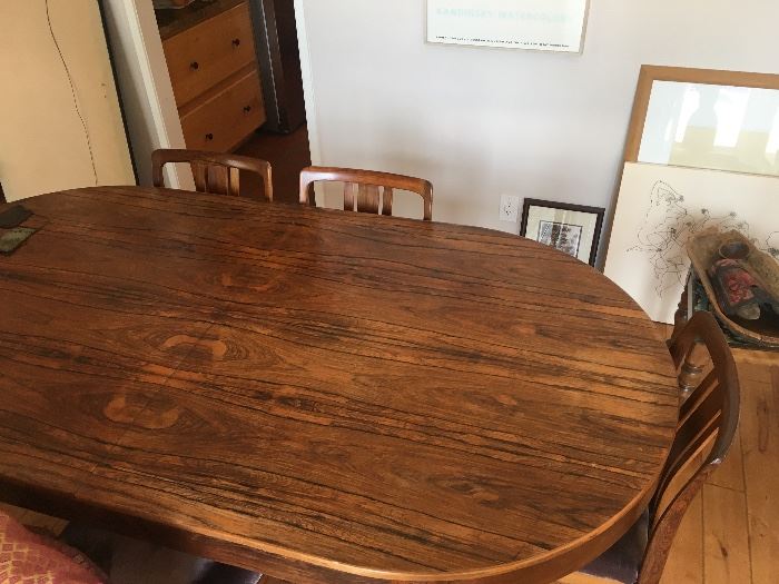 STUNNING ANTIQUE ROSEWOOD DINING TABLE AND CHAIRS. THE GRAIN ON THIS TABLE IS INCREDIBLY BEAUTIFUL! COVERED FOR SEVERAL YEARS.