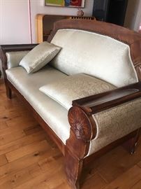 Art deco love seat, newly upholstered.