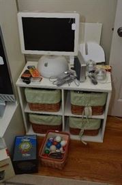 pair (also one on other side of tv stand) of white cubbie bookcase with baskets, miscellaneous balls