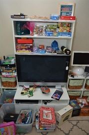 entertainment tv stand/bookshelf, flat screen TV - sold, more puzzles and games (Stratomatic baseball game) 