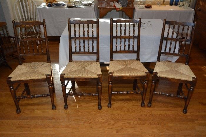 four woven bottom chairs