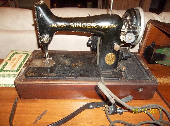 Singer portable sewing machine in wooden case