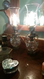 Smaller, cut glass table lamps on Eastlake-style dresser