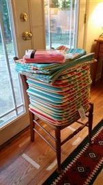 16 chair cushions, 16 coordinating placemats, tablecloth--SOLD, vinyl tablecloth