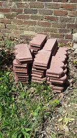 Red concrete scalloped paving edgers.