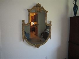 Antique shield design mirror