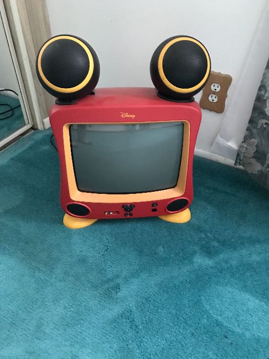 Disney Mickey Mouse TV with ear speakers.