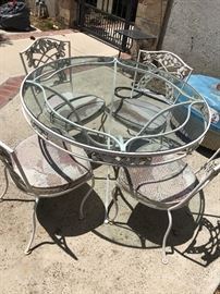 Wrought iron patio table and chairs