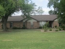 Investers welcome! Home on a one acre lot just around the corner from George Bush Tollway. Piers around entire house with lifetime transferrable warranty. Country living with the conveniences of the city. Bids are being accepted at 972-442-0244