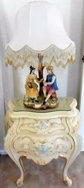 Silik Fine Italian Furniture - Nightstand with glass cover. 24 1/2" h, 21" w, 12" deep. $550 each. There are two. Comparable retail: $1,642. Capodimonte figural lamp with fringed shade $200 each
