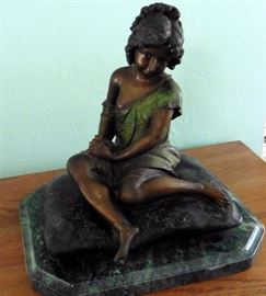 At a different location in 92128 zip: Bronze "Girl on Pillow". Signed A. Moreau. 15 1/2" high, 15 1/2" wide at base; 13" deep. $400