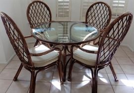 Rattan dining set. 45" diameter. $350