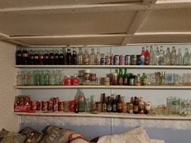 Coke bottles - vintage and lots of special bottles along with Pepsi, RC Cola, 7 Up bottles, Hires, Dad's Rootbeer, A&W bottles and some mugs - POP BOTTLES AND CANS WILL BE SOLD AS A LOT