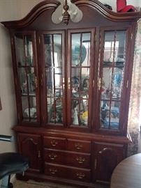 China cabinet and trinkets, figurines, plates, etc. Elvis, old car themed, colored glass, etc. 