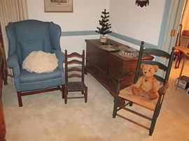 One of two wing chairs; two drawer blanket chest; early arm chair 