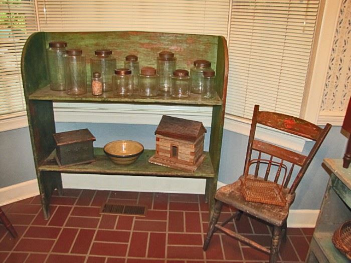 Bucket bench in green paint, pantry jars