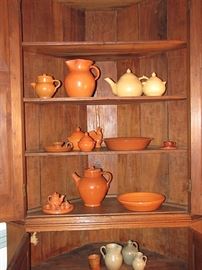 Jugtown pottery in orange and buff