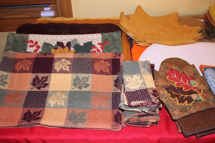 Thanksgiving placemats in various styles, matching napkins, potholders & oven mitts. Some never used, all well cared for