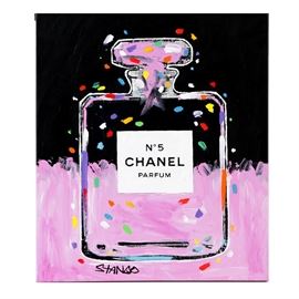 John Stango Mix Media on Canvas of Chanel in Pink: A serigraph with acrylic embellishments of a Chanel bottle in pink by listed Contemporary artist John Stango (b. 1958). This works features a print of a Chanel N°5 perfume bottle. The canvas is painted in pink acrylic along the bottom as well as the upper portion of the bottle. Flecks of acrylic paint in blue, orange, yellow are scattered throughout the composition. This piece is signed in black paint in the lower left corner and to the verso in black ink. To the verso, a horizontal hanging wire is present and this piece comes ready to hang. For a coordinating piece please view item number 16NYC025-171.