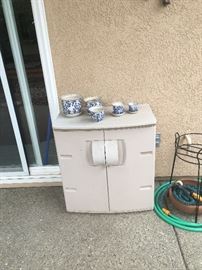 outdoor storage and pots