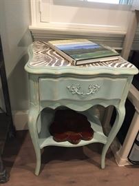 One of two painted side tables