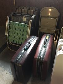 vintage suitcases and lawn chairs.  