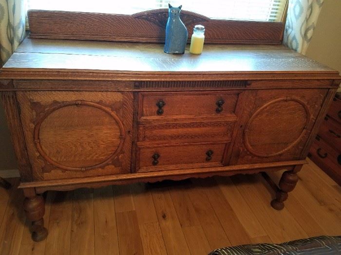 Flemish/Dutch Antique Craftsman/Mission/Arts and Crafts era piece. Very interesting circle design on the front panels of this Credenza/Side Board/Cupboard. 