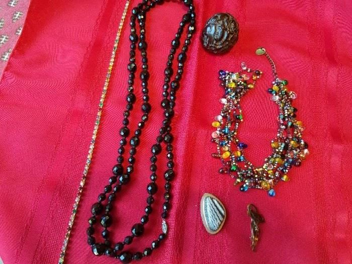 Rhinestones, Jet, some type of carved animal cinnabar or ?. Sterling Silver Pendants. Beaded Necklace. 