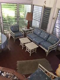 Rattan set couch, two chairs two end tables two small coffee tables one round dining table with 5 chairs
