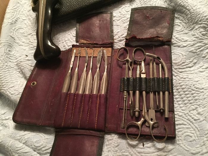 Several sets of antique medical equipment from the early 1900's