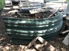 Radius lumber door frames for lattice wall enclosure