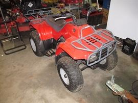 Kawasaki Bayou 220 4-wheeler ATV.