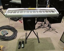 Casio Privia PX-555R keyboard/digital piano, w/stand and 2 M-Gear pedals.