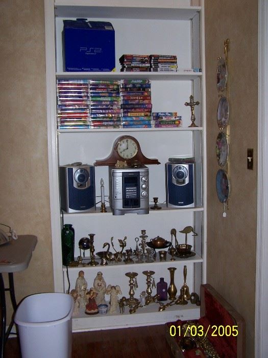 assortment of Brass items Play Station 2 and games, children's Video's and small Mantle Clock