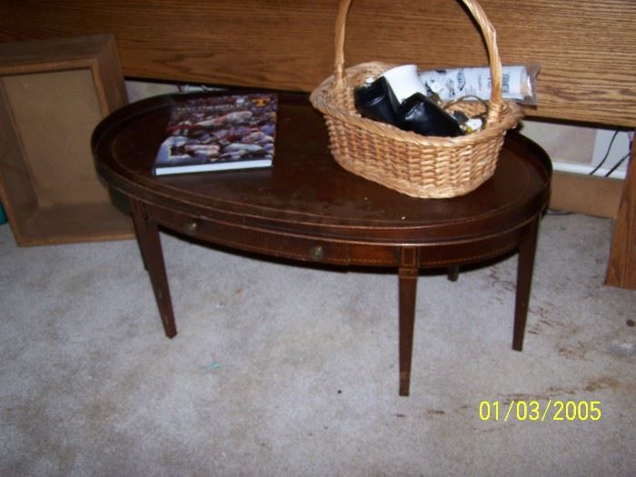 Coffee Table, UT Football Book, basket full of Camera equipment