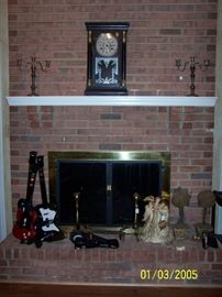 Columbia 8 Day Clock, Candle holders, Dog Irons, 3 Play Station Guitars, misc. items