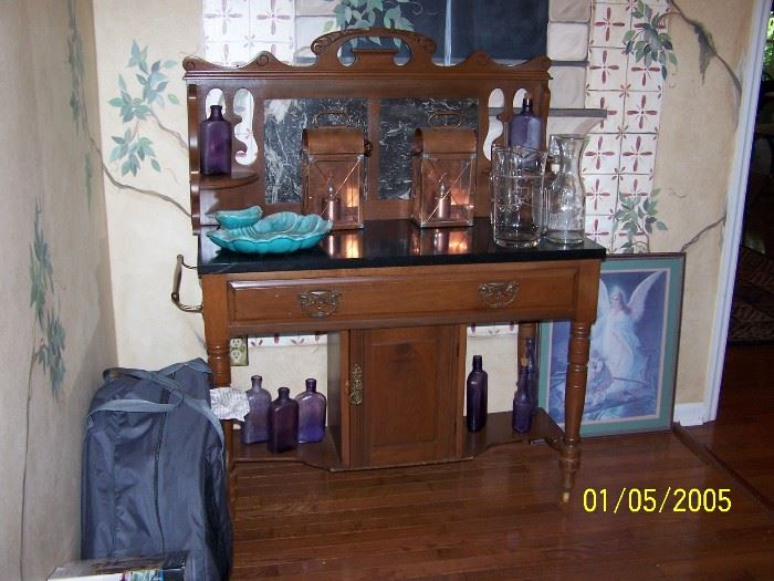 really  unique style Buffet, Copper Candle Holders, Vintage turquoise Chip and Dip Set, Bottles , Guardian Angel Picture, Chair in Bag and misc.