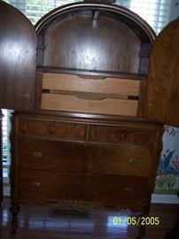 Armoire  with doors open showing 2 drawers and top shelf
