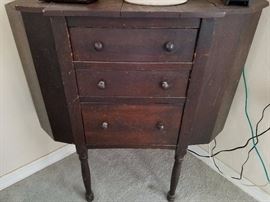 Antiqe side table with 3 drawers (damage to left side)