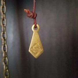 Embee 1930's Brass tag in grandfather clock 