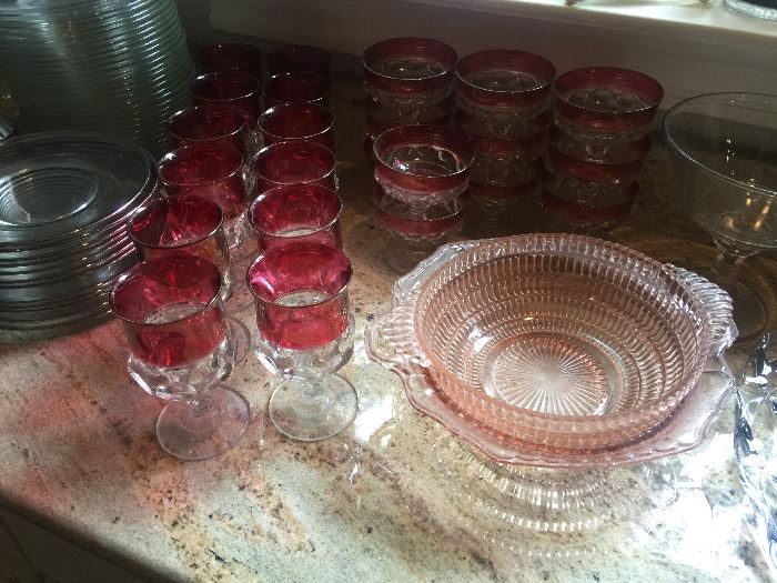 Cranberry stems and pink depression glass