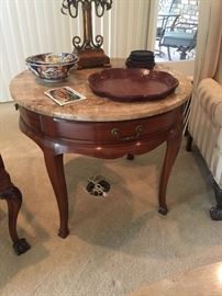 Marble top drum table with drawers