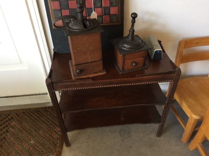Antique table and coffee grinders
