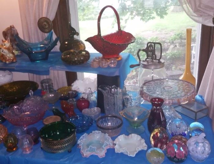 Vintage glassware including some Depression glass, art glass paperweights (2 are St. Clair), and a lovely Indiana Glass amberina basket. Fabulous antique kitchen churn is at the back of the picture.