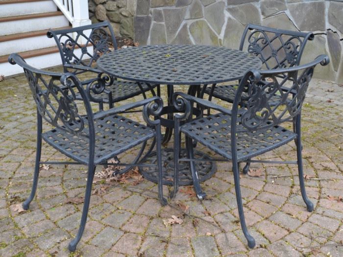 Cast aluminum table and 5 chairs